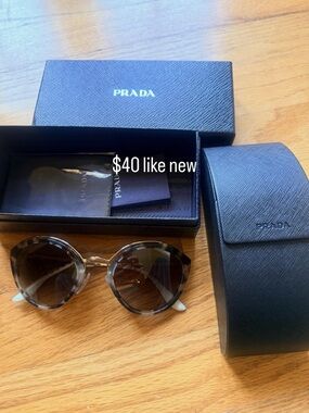 Prada women’s  Gray Brown Tortoiseshell Sunglasses